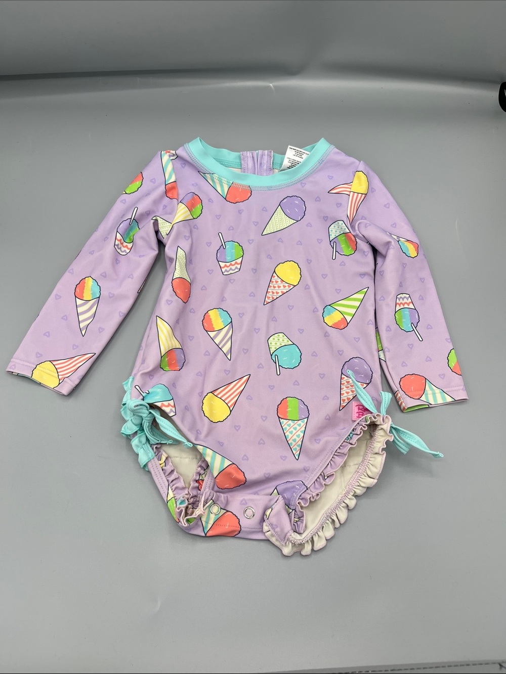 Ruffle Butts Snow cone Swimsuit size 18/24 months
